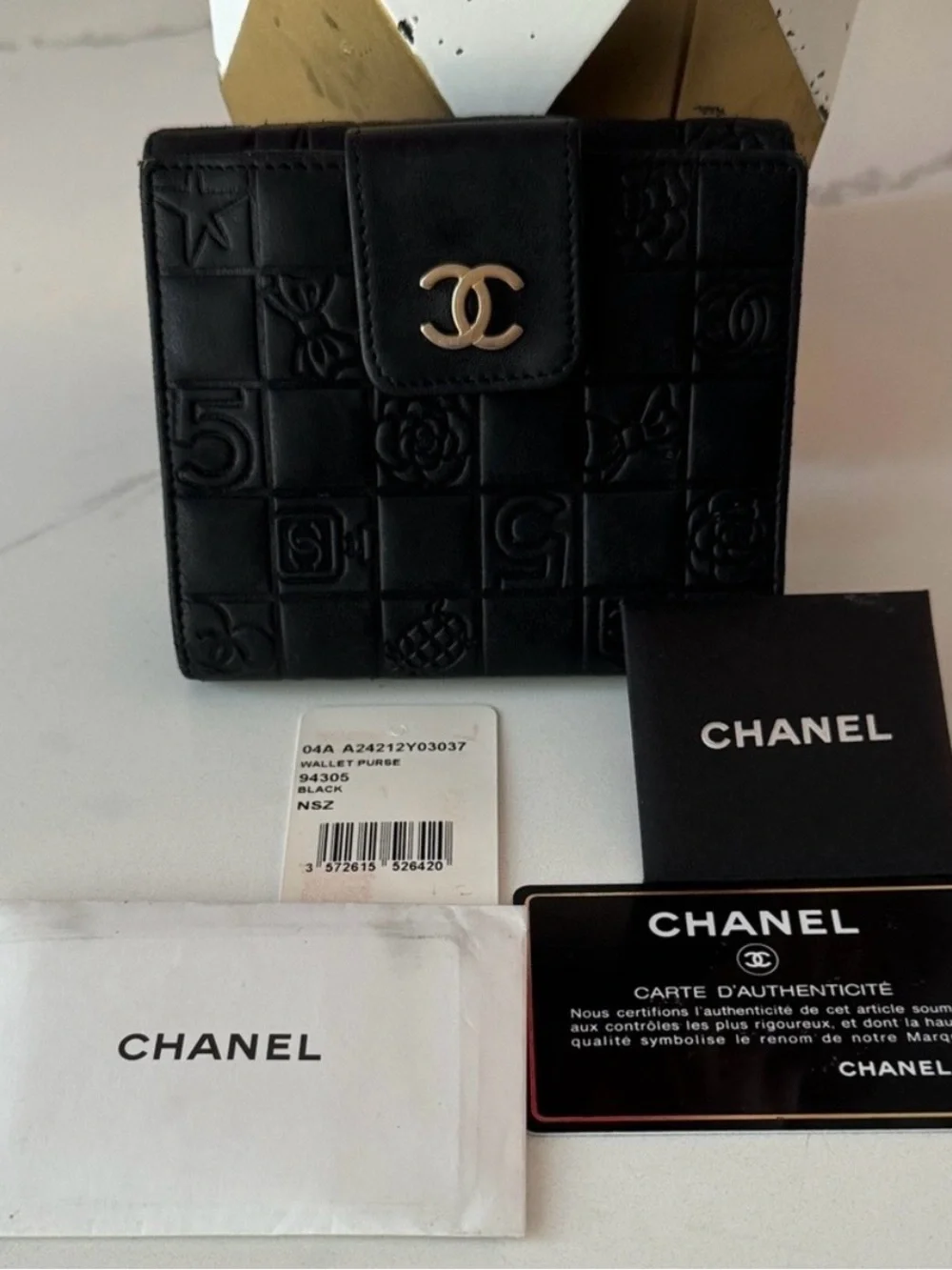 CHANEL Black Quilted Embossed Leather Small Wallet with Gold CC Snap